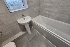 bathroom-with-grey-wall-floor-tiles-nuneaton