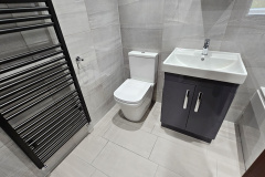 fitted-bathroom-wth-grey-vanity-basin-toilet-nuneaton