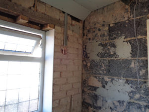 Nuneaton Bathrooms going back to brick exposing brick and ask block